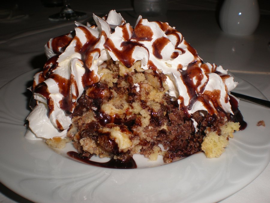 traditional cake Blejska grmada : made of pastry, raisins, rum, nuts, etc. with whipped cream and chocolate sauce-yummy!