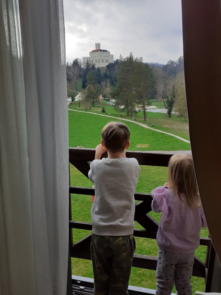 my kids and our hotel room view to Trakošćan castle